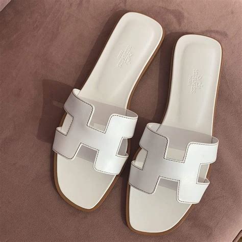 hermes breuningerhermes oran weiss|hermes oran sandals.